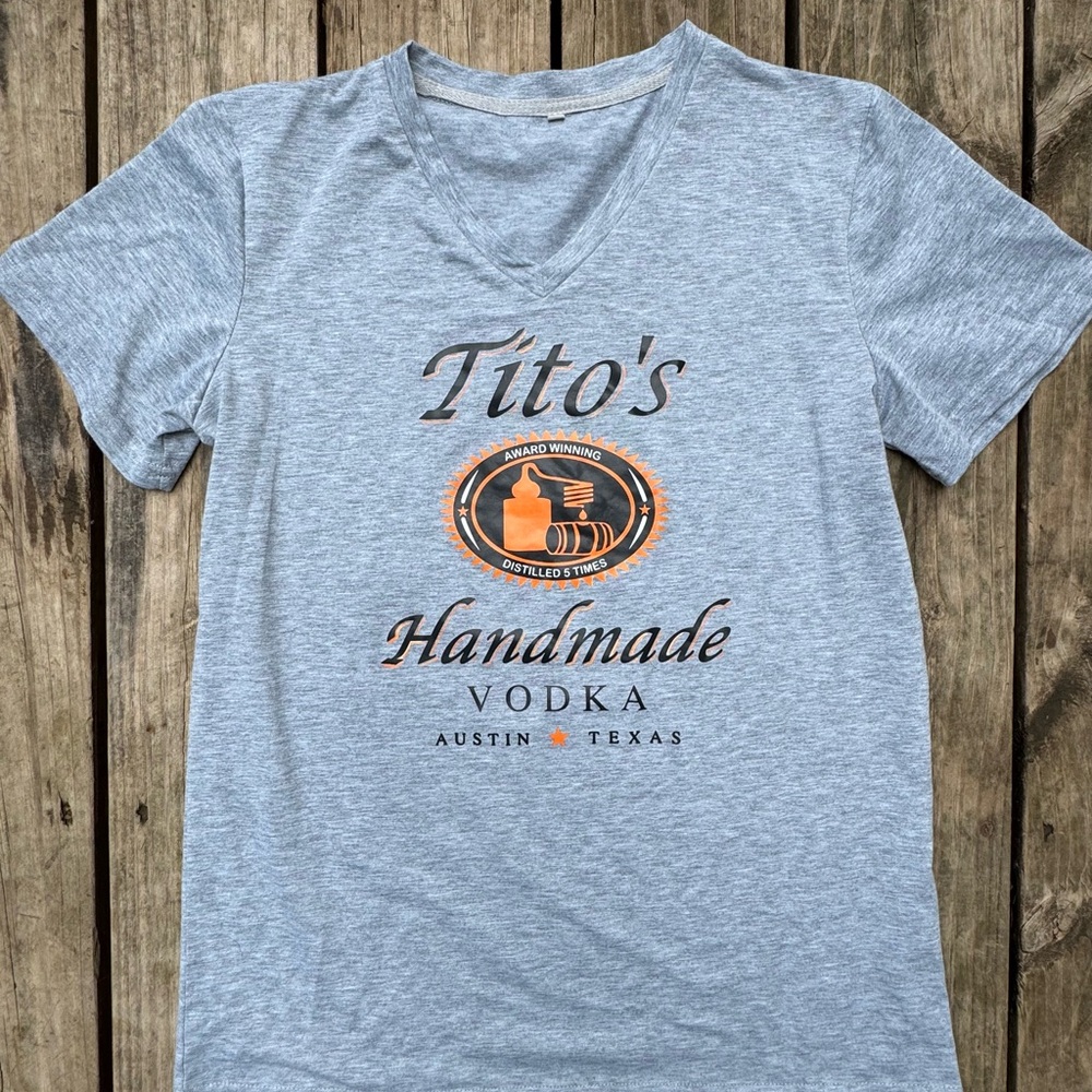 Grey Tito’s vodka vneck tshirt - size M